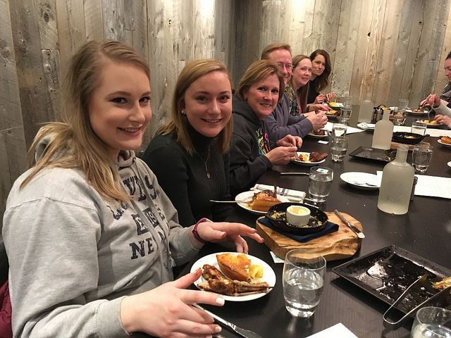 Minneapolis skyway food tour participants enjoy some tastey bites. 